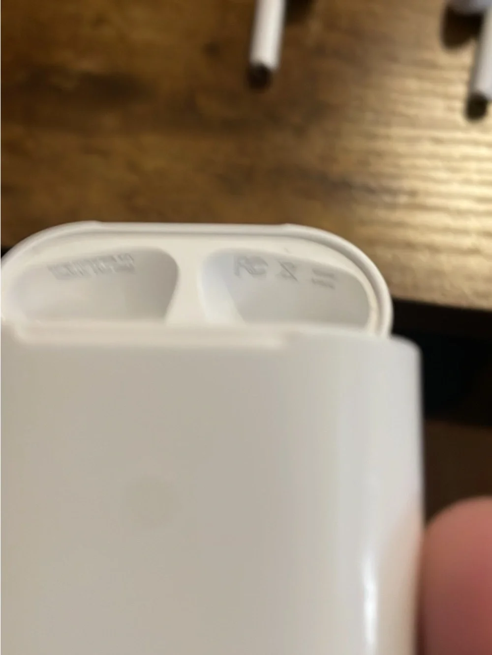 Apple AirPods 2nd Generation with Charging Case (Charging Cord Included)